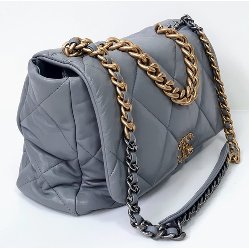 39 - A Chanel 19 Maxi Grey Leather Flap Bag. Soft quilted leather exterior. Two tone furniture. Chanel lo... 