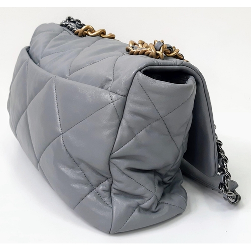 39 - A Chanel 19 Maxi Grey Leather Flap Bag. Soft quilted leather exterior. Two tone furniture. Chanel lo... 