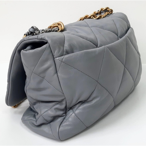 39 - A Chanel 19 Maxi Grey Leather Flap Bag. Soft quilted leather exterior. Two tone furniture. Chanel lo... 