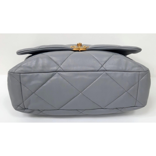 39 - A Chanel 19 Maxi Grey Leather Flap Bag. Soft quilted leather exterior. Two tone furniture. Chanel lo... 