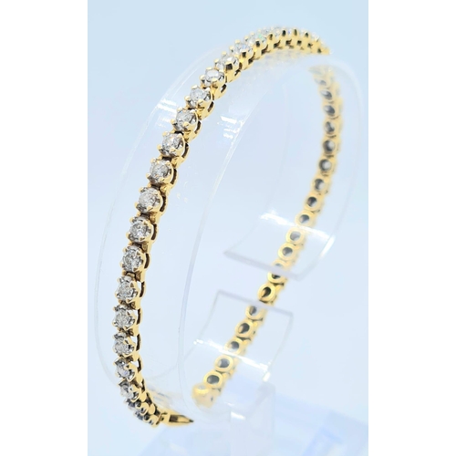 150 - 4ct diamond tennis bracelet set in 18k yellow gold, weight 11.9g and 19cm long approx