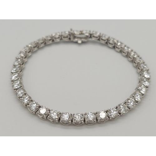 52 - 11ct diamond tennis bracelet, set in 18k white gold, 37 round brilliant diamond stones with top qual... 