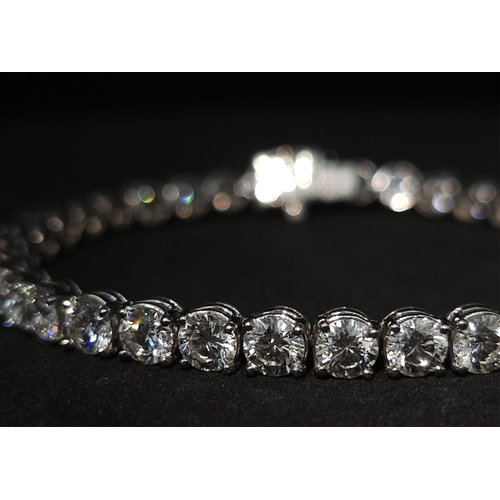 52 - 11ct diamond tennis bracelet, set in 18k white gold, 37 round brilliant diamond stones with top qual... 