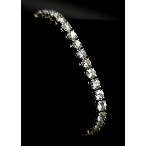 52 - 11ct diamond tennis bracelet, set in 18k white gold, 37 round brilliant diamond stones with top qual... 