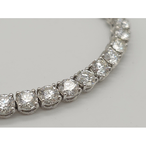 52 - 11ct diamond tennis bracelet, set in 18k white gold, 37 round brilliant diamond stones with top qual... 