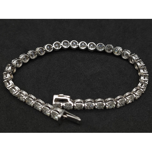 52 - 11ct diamond tennis bracelet, set in 18k white gold, 37 round brilliant diamond stones with top qual... 