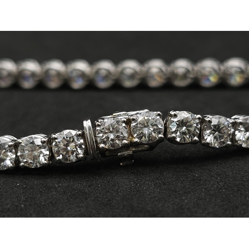 52 - 11ct diamond tennis bracelet, set in 18k white gold, 37 round brilliant diamond stones with top qual... 