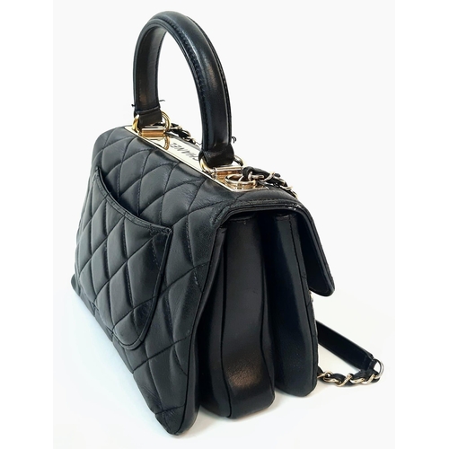 61 - A Stylish Chanel Top-Plate Hand/Shoulder Flap Bag. Quilted soft black leather. Gold tone hardware wi... 