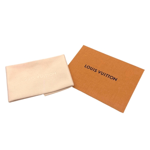 185 - A Louis Vuitton Burgundy Patent Leather Bag. Monogram exterior with gilded handle. Textile interior ... 