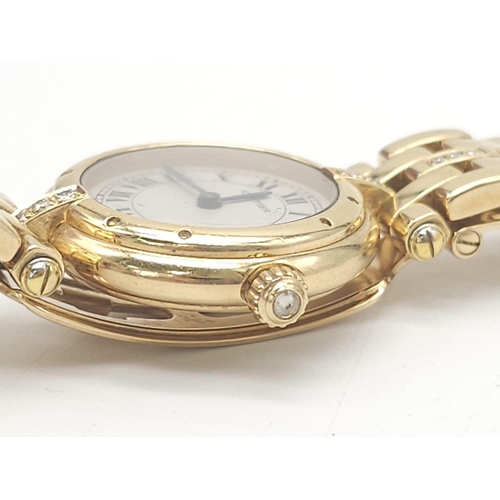 59 - A Cartier 18K Gold and Diamond Panthere Ladies Watch. 18k yellow gold and diamond bracelet. 18k gold... 