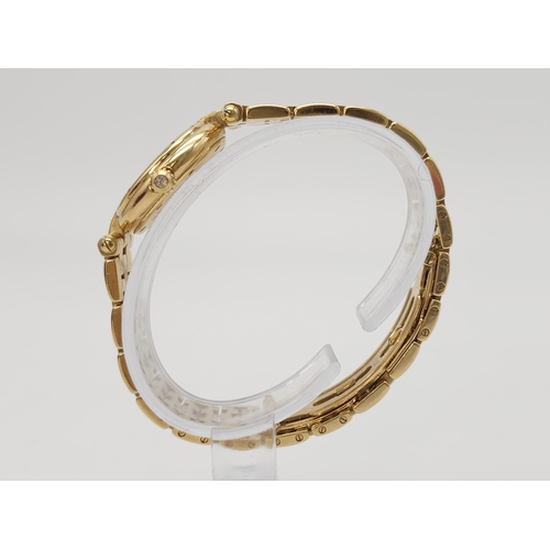 59 - A Cartier 18K Gold and Diamond Panthere Ladies Watch. 18k yellow gold and diamond bracelet. 18k gold... 