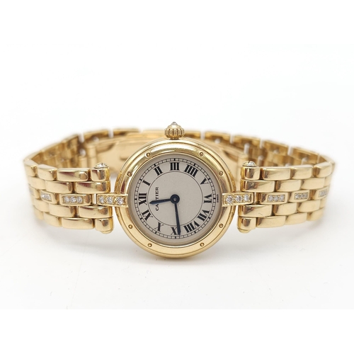 59 - A Cartier 18K Gold and Diamond Panthere Ladies Watch. 18k yellow gold and diamond bracelet. 18k gold... 