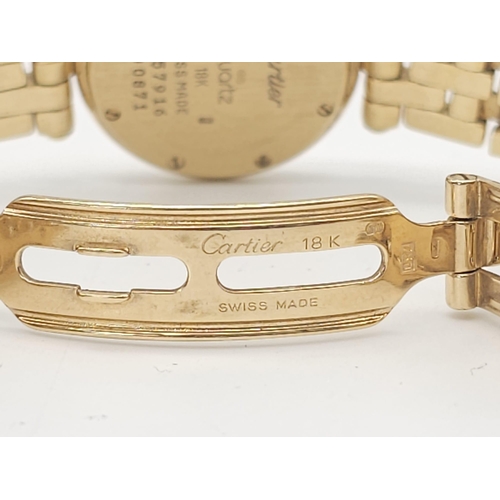 59 - A Cartier 18K Gold and Diamond Panthere Ladies Watch. 18k yellow gold and diamond bracelet. 18k gold... 