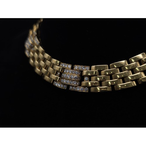 10 - A Cartier 18K Yellow Gold and Diamond Maillon Necklace. Brilliantly crafted with gate links and (3) ... 