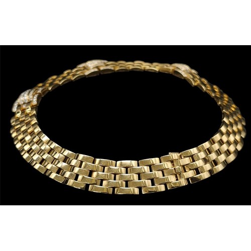 10 - A Cartier 18K Yellow Gold and Diamond Maillon Necklace. Brilliantly crafted with gate links and (3) ... 