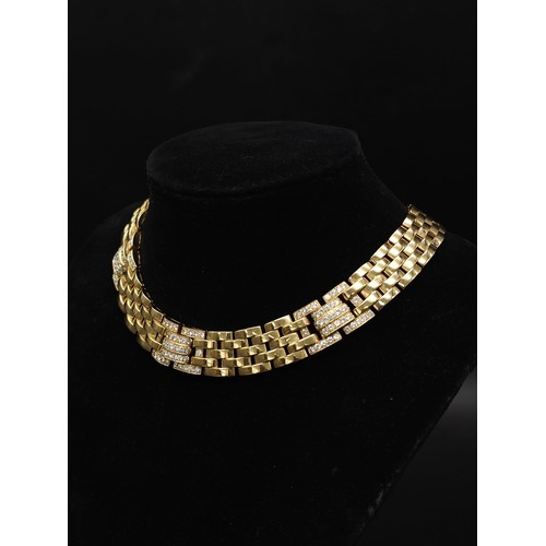 10 - A Cartier 18K Yellow Gold and Diamond Maillon Necklace. Brilliantly crafted with gate links and (3) ... 