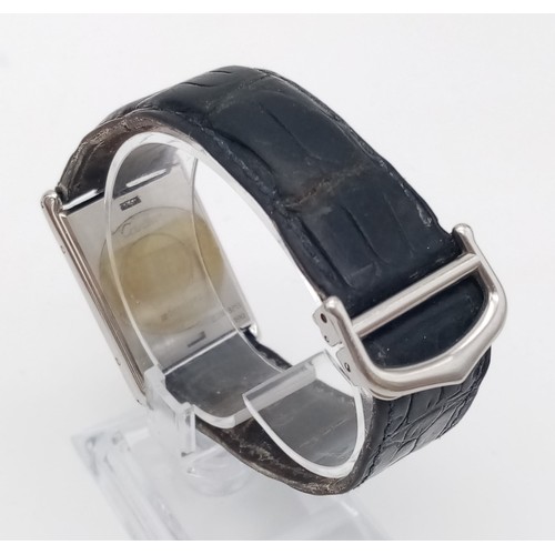 80 - A Vintage Cartier Basculante Mechanical Tank Watch. Black leather strap with Cartier clasp. Stainles... 