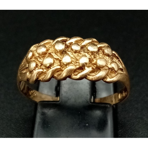 497 - A Vintage 9K Yellow Gold Keeper Ring. Size O. 2.31g.