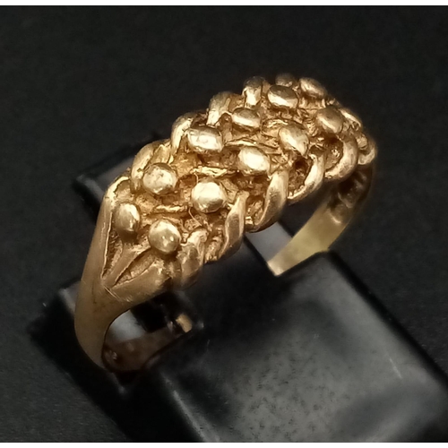 497 - A Vintage 9K Yellow Gold Keeper Ring. Size O. 2.31g.