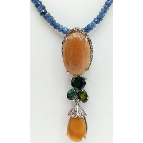 337 - An Opal and Sapphire Bead Necklace with Diamonds. Two Opal Pendants with a halo of diamond accents o... 