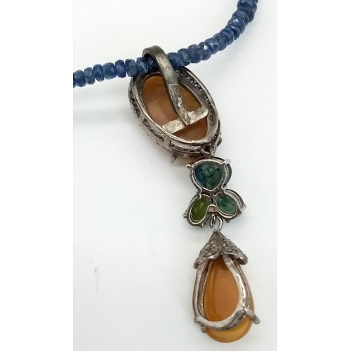 337 - An Opal and Sapphire Bead Necklace with Diamonds. Two Opal Pendants with a halo of diamond accents o... 