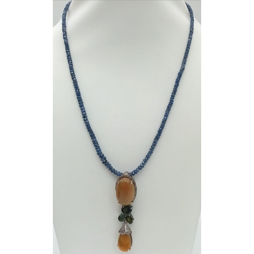 337 - An Opal and Sapphire Bead Necklace with Diamonds. Two Opal Pendants with a halo of diamond accents o... 