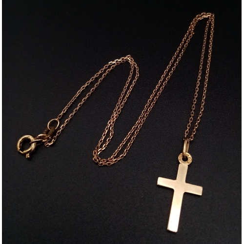 545 - A 9K Yellow Gold Cross Pendant on a 9K Yellow Gold Disappearing Necklace. 25mm and 42cm. 2.3g total ... 