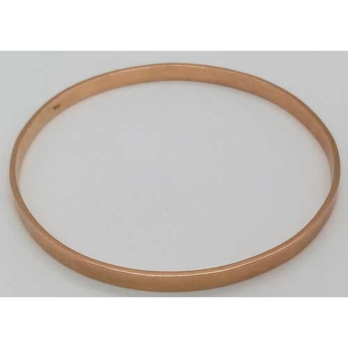 103 - A Vintage Classic 9K Yellow Gold Bangle. 6cm inner diameter. 11.8g