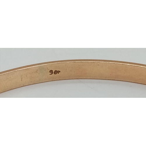 103 - A Vintage Classic 9K Yellow Gold Bangle. 6cm inner diameter. 11.8g