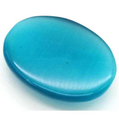 154 - An amazing, huge (263 carats), blue CAT’S EYE (variety of Chrysoberyl). Oval cabochon, lab created, ... 