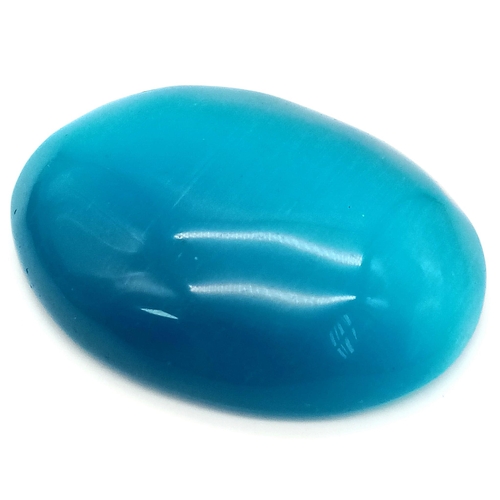 154 - An amazing, huge (263 carats), blue CAT’S EYE (variety of Chrysoberyl). Oval cabochon, lab created, ... 