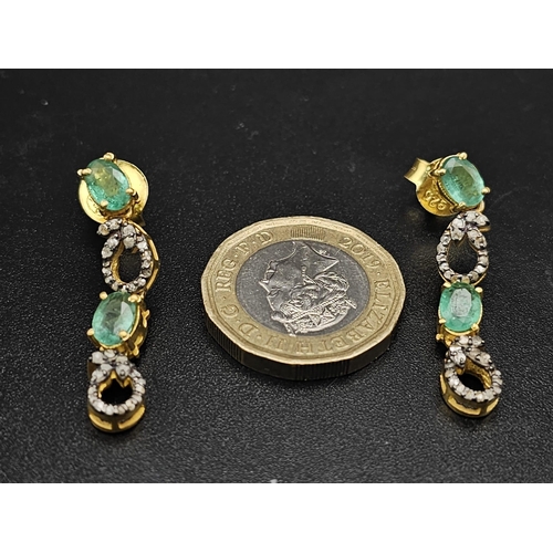 412 - A Pair of Natural Emerald Gemstone Drop Earrings set in 925 Silver with Diamond Accents of 0.60ct. C... 