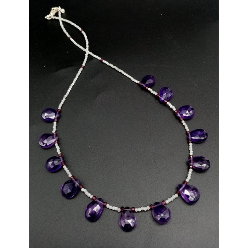 426 - A 100ct Amethyst and Moonstone Gemstone Necklace with a 925 Silver Clasp. 46cm.