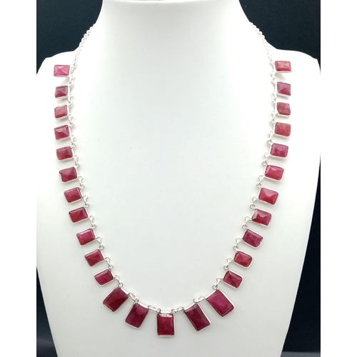 440 - A Graduating Ruby Gemstone Chain Necklace set in 925 Silver. 43cm. 22g total weight.