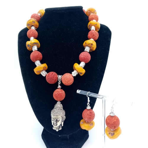 105 - A substantial, Tibetan silver, Buddhist, butterscotch amber and red coral necklace and earrings set ... 