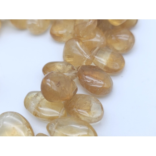 168 - A regal, three rows of pear shaped, polished citrines necklace. Length: 46-52 cm, weight: 272 g