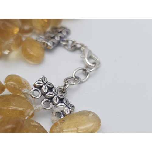 168 - A regal, three rows of pear shaped, polished citrines necklace. Length: 46-52 cm, weight: 272 g