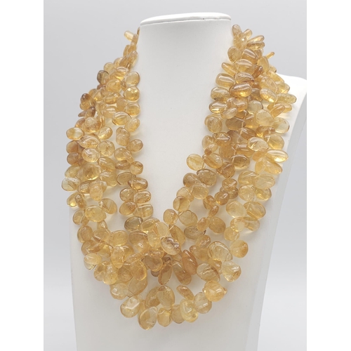 168 - A regal, three rows of pear shaped, polished citrines necklace. Length: 46-52 cm, weight: 272 g