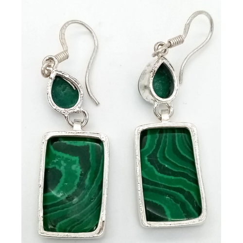 217 - A malachite necklace and earrings set. Necklace length: 44 cm, earrings drop: 6 cm, total weight: 70... 