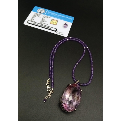 330 - A 71ct Amethyst Large Oval Gemstone Pendant with 0.15ct Diamond Accents on its Attachment Loop. Come... 