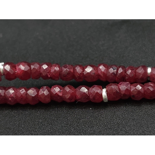 433 - A 120ct Ruby Bead Gemstone Necklace with a Ruby Drop Pendant. 3/4mm beads. 3cm and 42cm.