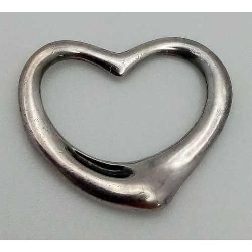 199 - A Tiffany and Co. Sterling Silver Heart Pendant. 25mm width.