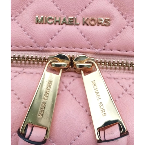 295 - A Pink Michael Kors Mini Rhea Zip Quilted Leather Backpack With A Convertible Strap. See Photos for ... 