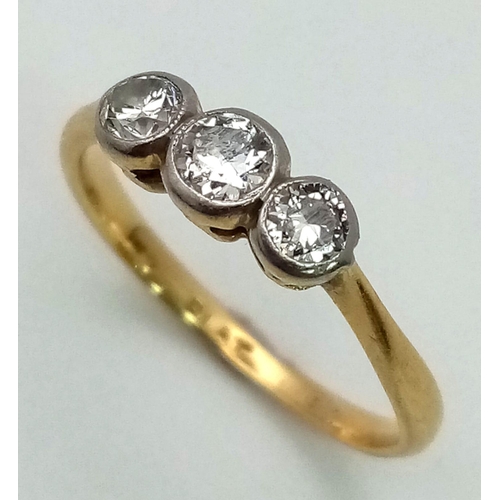 408 - A Vintage 18K Gold, Platinum and Old Cut Diamond Trilogy Ring. Size J. 1.78g total weight.