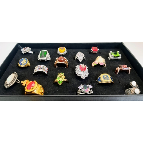 231 - An eclectic collection of dress rings, eighteen in total