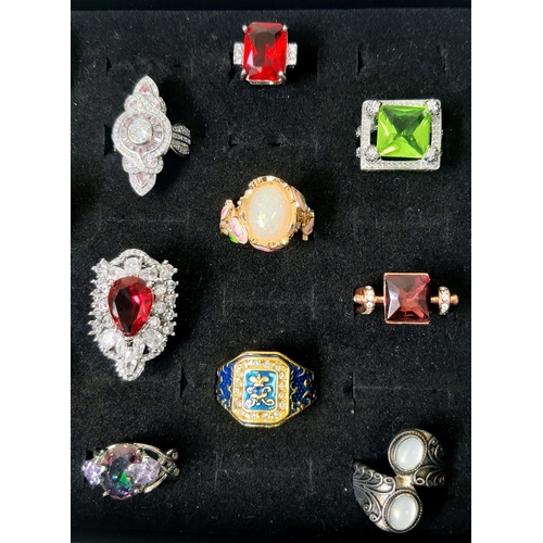 231 - An eclectic collection of dress rings, eighteen in total