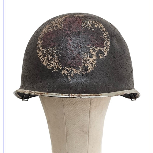 237 - Semi Relic WW2 US Rangers Medic’s M1 Helmet. Early War fixed Bale with front split seam.