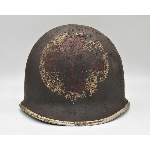 237 - Semi Relic WW2 US Rangers Medic’s M1 Helmet. Early War fixed Bale with front split seam.