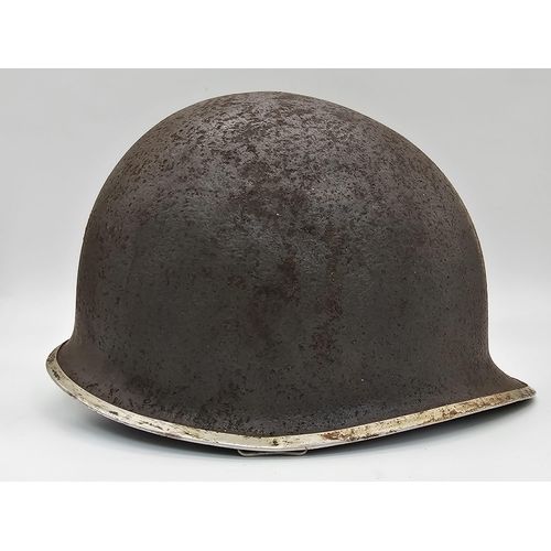 237 - Semi Relic WW2 US Rangers Medic’s M1 Helmet. Early War fixed Bale with front split seam.