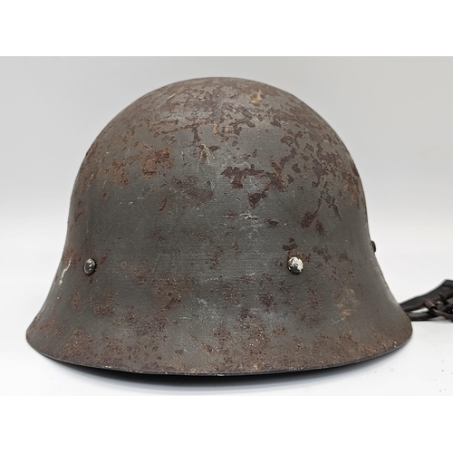 502 - WW2 Japanese Civil Defence (Home Guard) Helmet with loner.